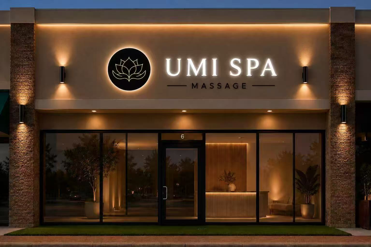 UMI SPA storefront design with an illuminated sign and warm entrance